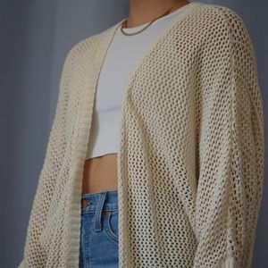 Urban Outfitters “Kimchi Blue” cream knit sweater, M
